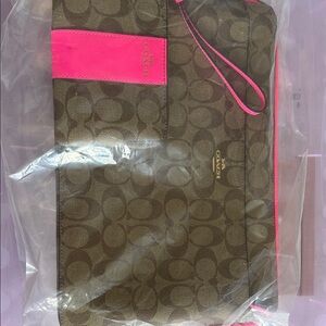 Coach Brown Signature Canvas Wristlet with Hot Pink Trim and Strap